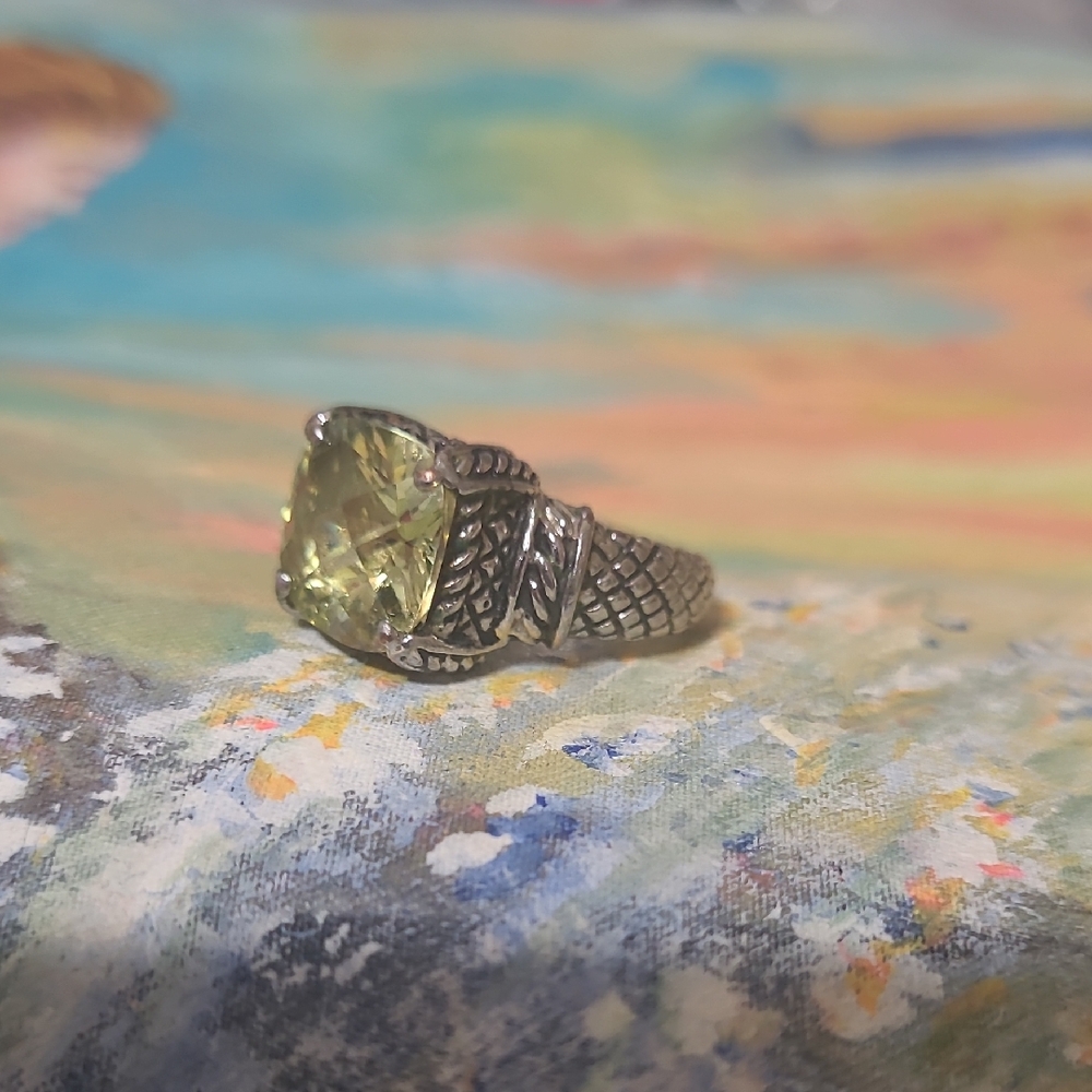 Elegant Silver and Yellow Gemstone Ring